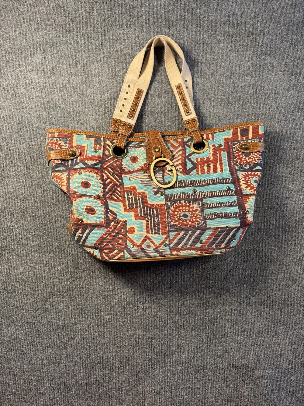 GUESS tribal print canvas tote with brown faux-croc leather accents